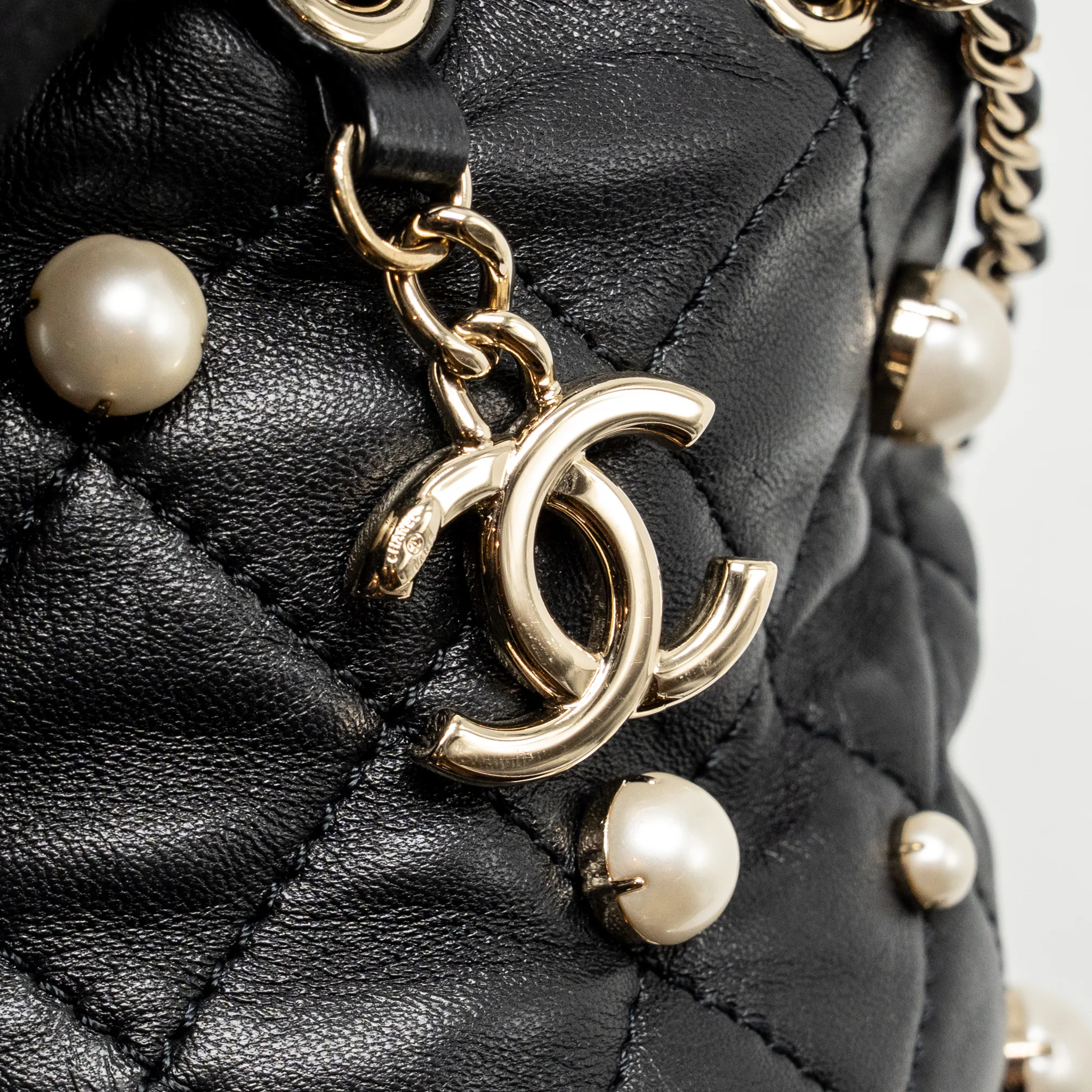 Chanel About Pearls Quilted Drawstring Bucket Bag Lambskin Black LGHW - Image 13