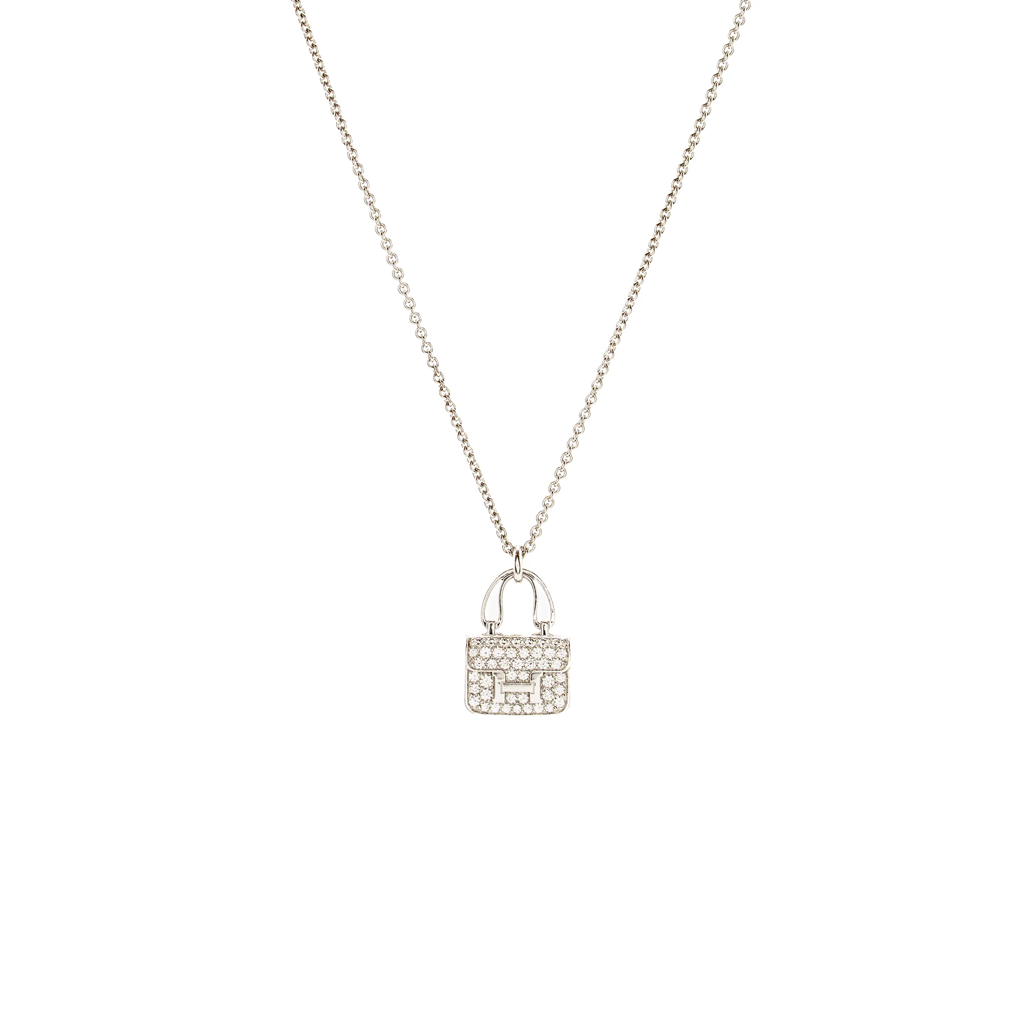 Hermes constance amulette pendant white gold diamonds