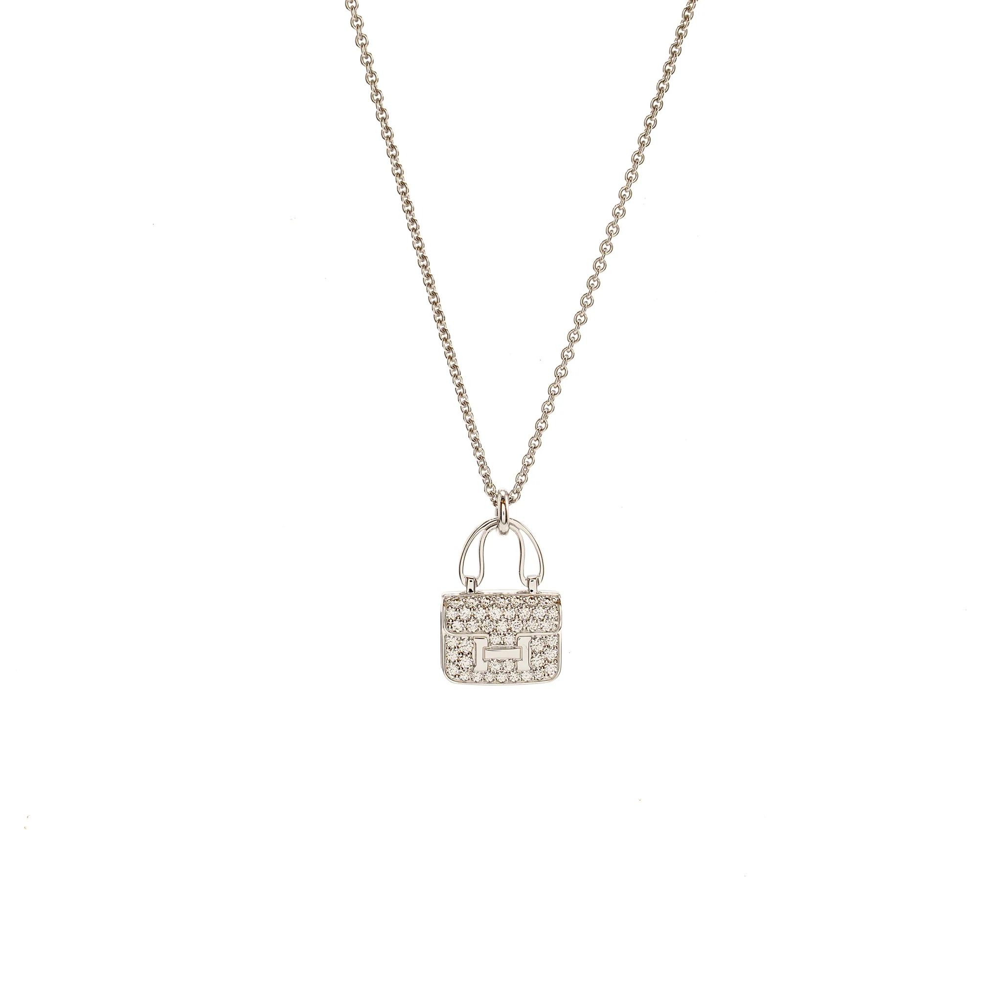 Hermes constance amulette pendant white gold with diamonds